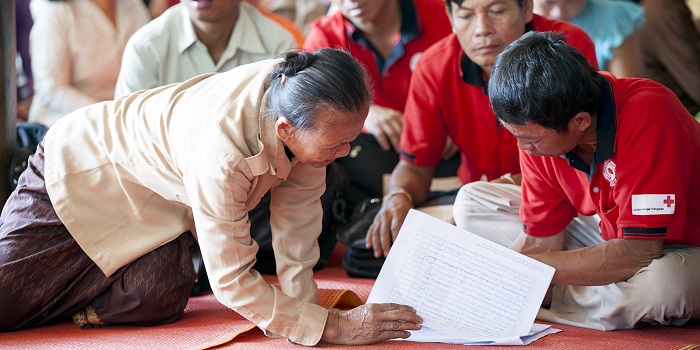 Khammouane Province, Laos, 2015

Planning checks.
Members of Village Disaster Protection Units go over the schedule for a Community Based Disaster Risk Reduction simulation. The exercises and drills focus on disaster preparedness and response at village level, ensuring communities are equipped with skills to activate emergency plans and save lives.

Through the simulation project Lao Red Cross and partner French Red Cross, with support from the European Union, are improving safety for vulnerable communities.