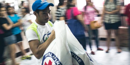 Philippines. Manila, 2013. Typhoon Haiyan struck Philippines 8th November, 2013. Volunteers and staff working with food items at Philippine Red Cross HQ. Jarkko Mikkonen/Finnish Red Cross.