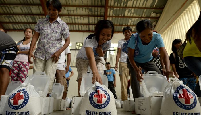 Flood affected residents of Barangay Delfin, Albano, Isabela, receive relief goods from Red Cross on October 20, 2015.Flood affected residents of Barangay Delfin, Albano, Isabela, receive relief goods from Red Cross on October 20, 2015.